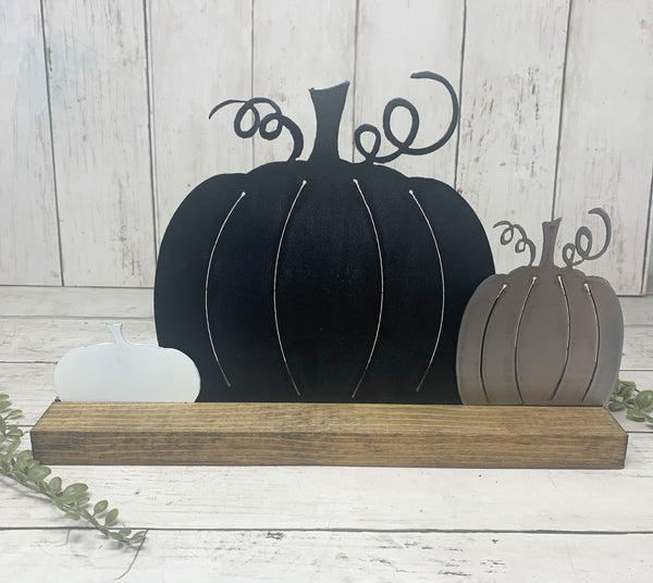 Neutral Color Fall Pumpkins on Wood Stand
