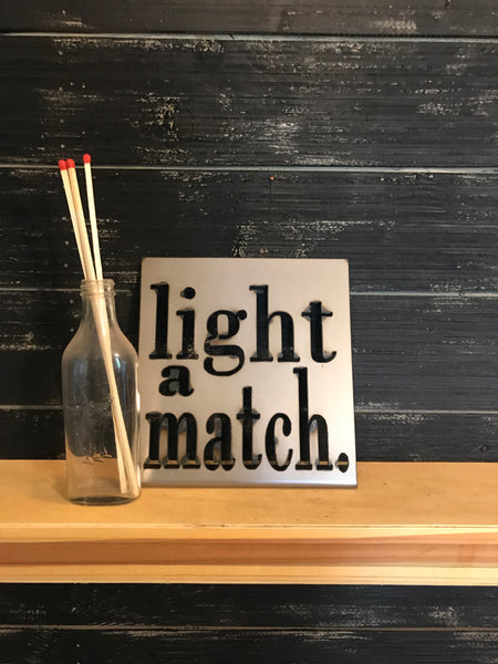 Light a Match Bathroom Metal Shelf Sitting Sign